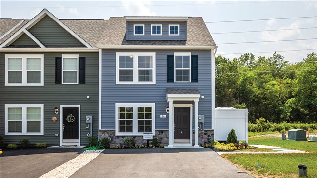 New Homes in Whispering Pines Townhomes by DRB Homes